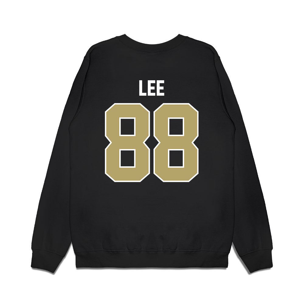 Central Florida - NCAA Football : Cam Lee - Vintage Helmet Premium Crewneck Sweatshirt-1