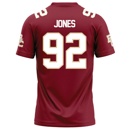 Boston College - NCAA Football : Caleb Jones - Maroon Football Jersey