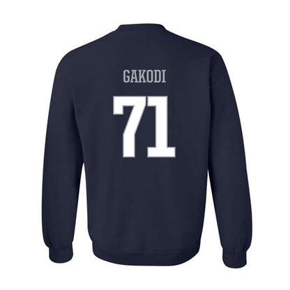Monmouth - NCAA Football : Moses Gakodi - Classic Shersey Crewneck Sweatshirt-1