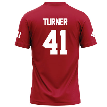  - NCAA Football : Reece Turner - Red Football Jersey-1