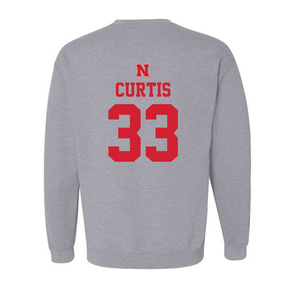 Nebraska - NCAA Men's Basketball : Leo Curtis - Sports Shersey Crewneck Sweatshirt-1