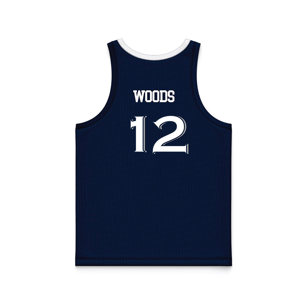 Xavier - NCAA Women's Basketball : Kaysia Woods - Basketball Jersey