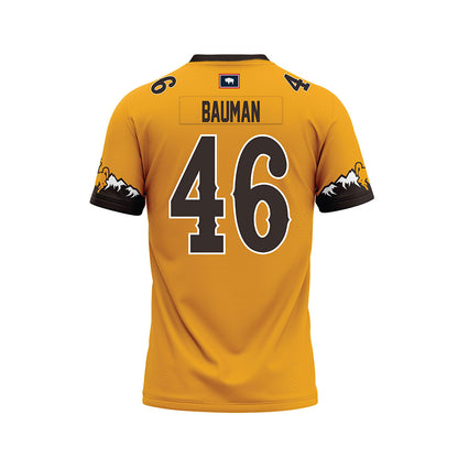 Wyoming - NCAA Football : Dash Bauman - Gold Premium Football Jersey