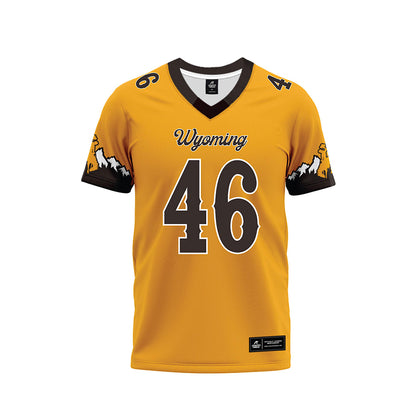 Wyoming - NCAA Football : Dash Bauman - Gold Premium Football Jersey