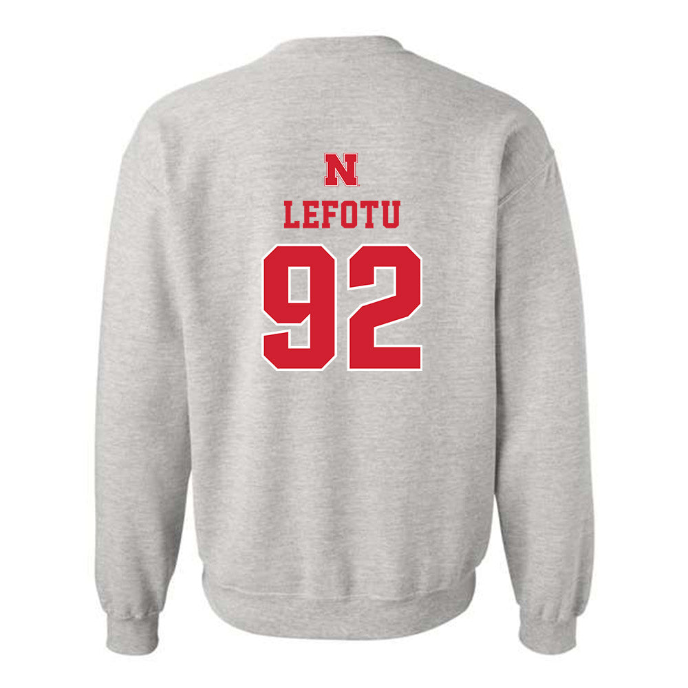 Nebraska - NCAA Football : Sua Lefotu - Crewneck Sweatshirt