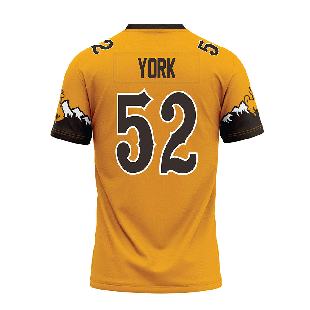 Wyoming - NCAA Football : Carson York - Gold Premium Football Jersey