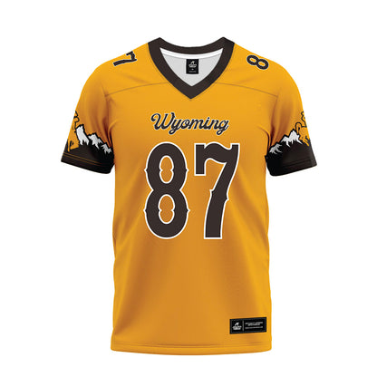 Wyoming - NCAA Football : Isaac Schoenfeld - Gold Premium Football Jersey