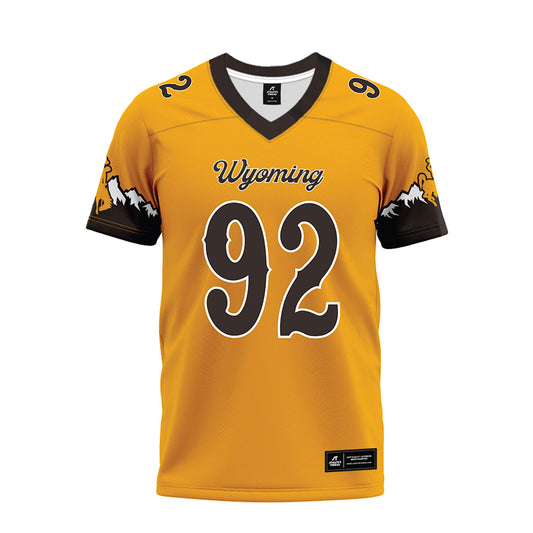 Wyoming - NCAA Football : Dante Drake - Gold Premium Football Jersey