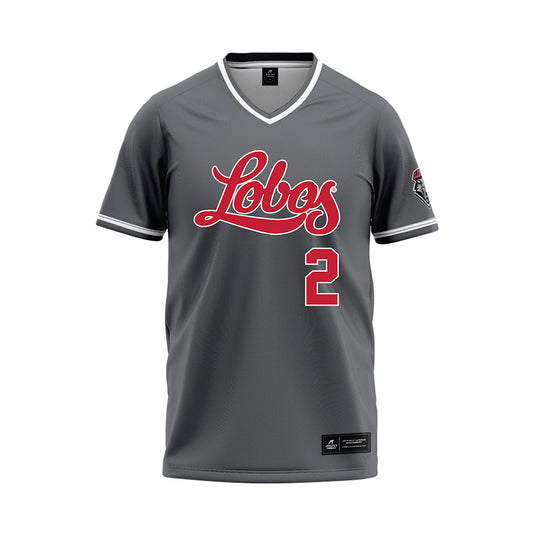 New Mexico - NCAA Softball : Caprice Barela - Dark Grey Baseball Jersey-0