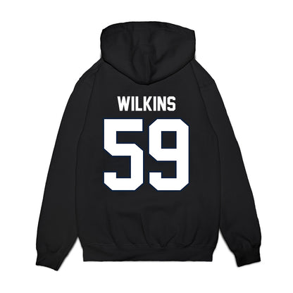 UConn - NCAA Football : Finn Wilkins - Vintage Helmet Premium Hooded Sweatshirt-1