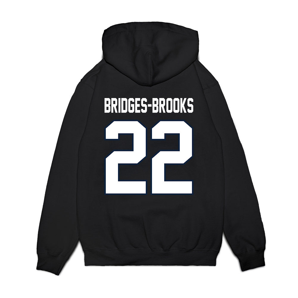 UConn - NCAA Football : Axavier Bridges-Brooks - Vintage Helmet Premium Hooded Sweatshirt-1