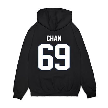 UConn - NCAA Football : Ty Chan - Vintage Helmet Premium Hooded Sweatshirt-1