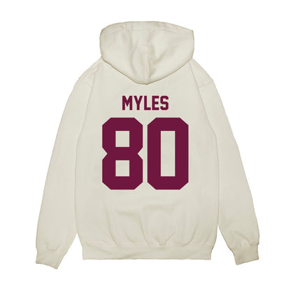 Texas A&M - NCAA Football : Jerome Myles - Vintage Helmet Premium Hooded Sweatshirt-1