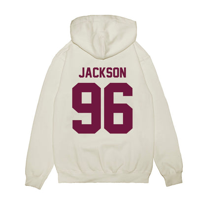 Texas A&M - NCAA Football : Nathan Jackson - Vintage Helmet Premium Hooded Sweatshirt-1