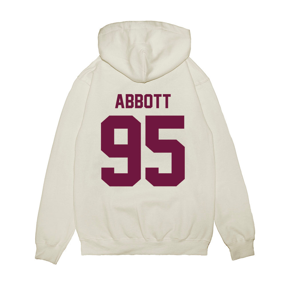 Texas A&M - NCAA Football : Alex Abbott - Vintage Helmet Premium Hooded Sweatshirt-1