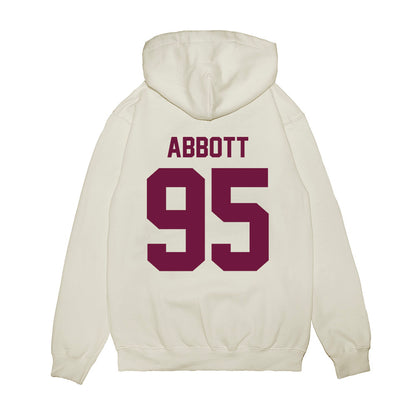 Texas A&M - NCAA Football : Alex Abbott - Vintage Helmet Premium Hooded Sweatshirt-1