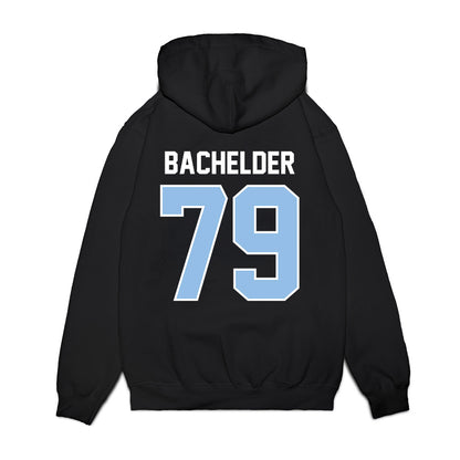 Old Dominion - NCAA Football : Theo Bachelder - Vintage Helmet Premium Hooded Sweatshirt-1