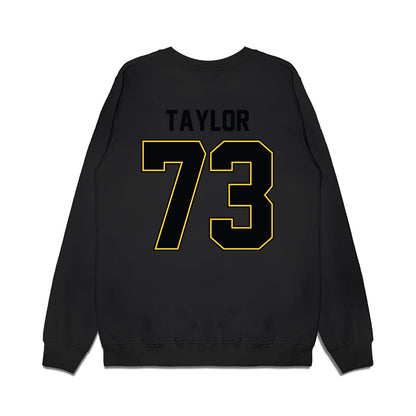 PLU - NCAA Football : Draven Taylor - Vintage Helmet Premium Crewneck Sweatshirt-1