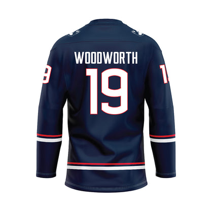 UConn - NCAA Women's Ice Hockey : Megan Woodworth - Navy Hockey Jersey