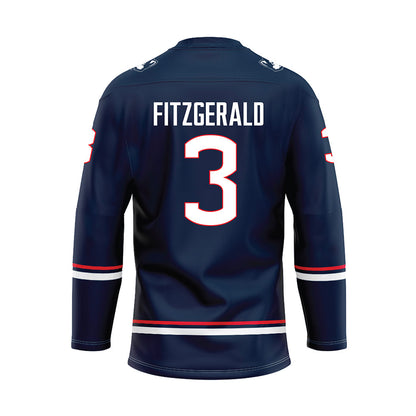 UConn - NCAA Men's Ice Hockey : Kevin Fitzgerald - Navy Hockey Jersey