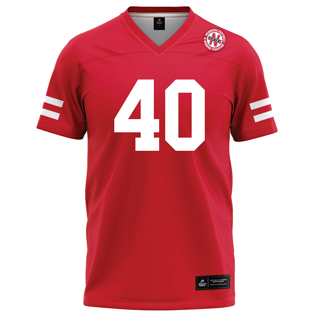 Nebraska - NCAA Football : Trevor Ruth - Red Football Jersey