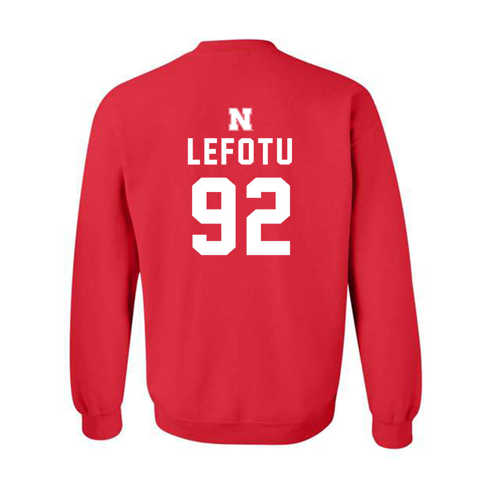 Nebraska - NCAA Football : Sua Lefotu - Crewneck Sweatshirt