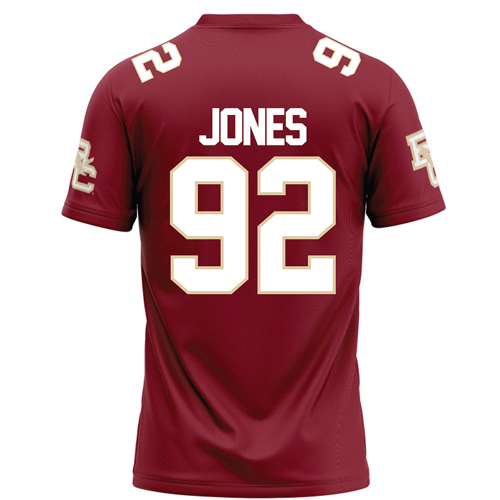 Boston College - NCAA Football : Caleb Jones - Maroon Football Jersey