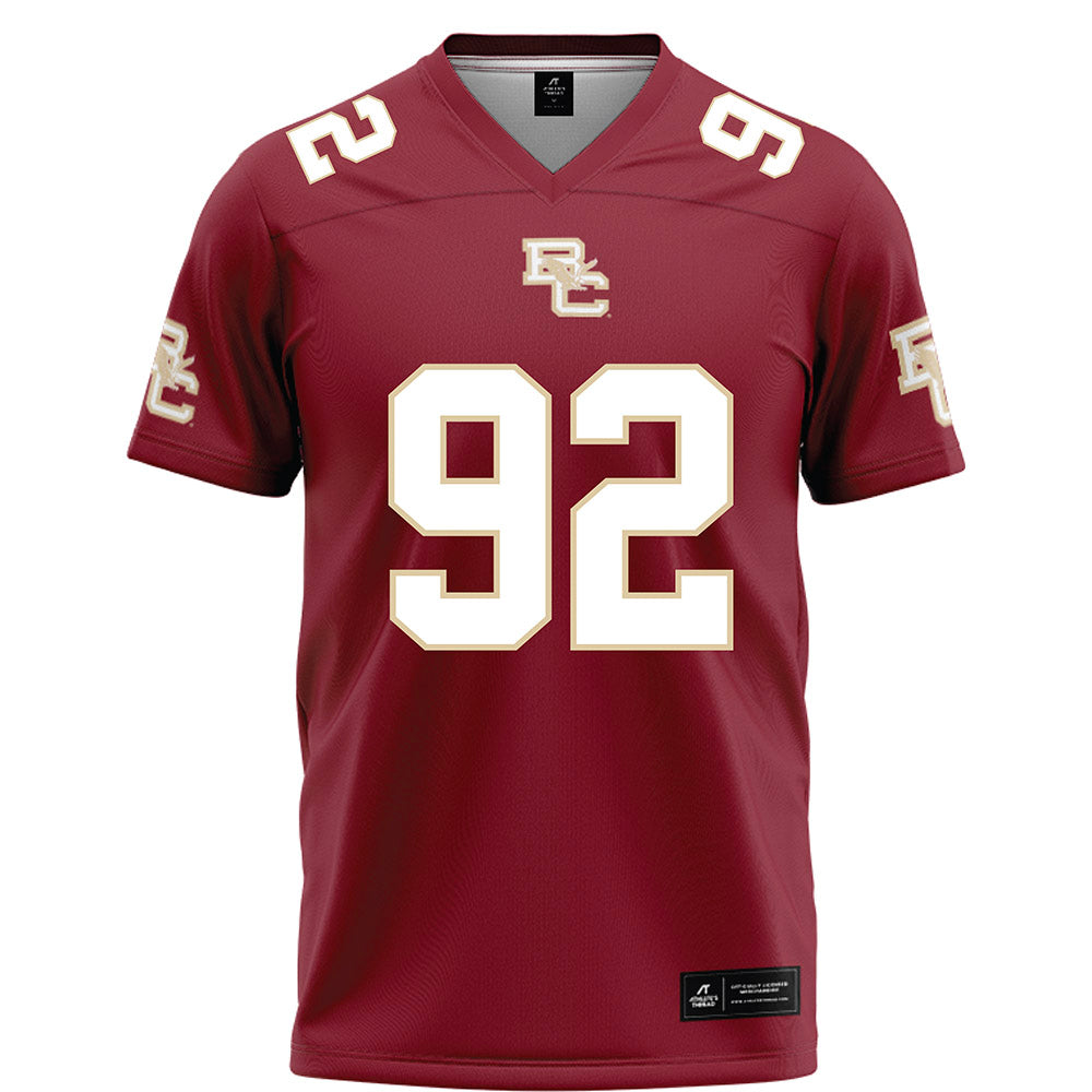 Boston College - NCAA Football : Caleb Jones - Maroon Football Jersey