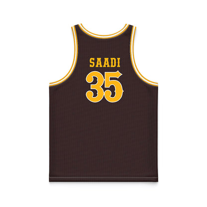 Wyoming - NCAA Men's Basketball : Simm-Marten Saadi - Brown Basketball Jersey-1