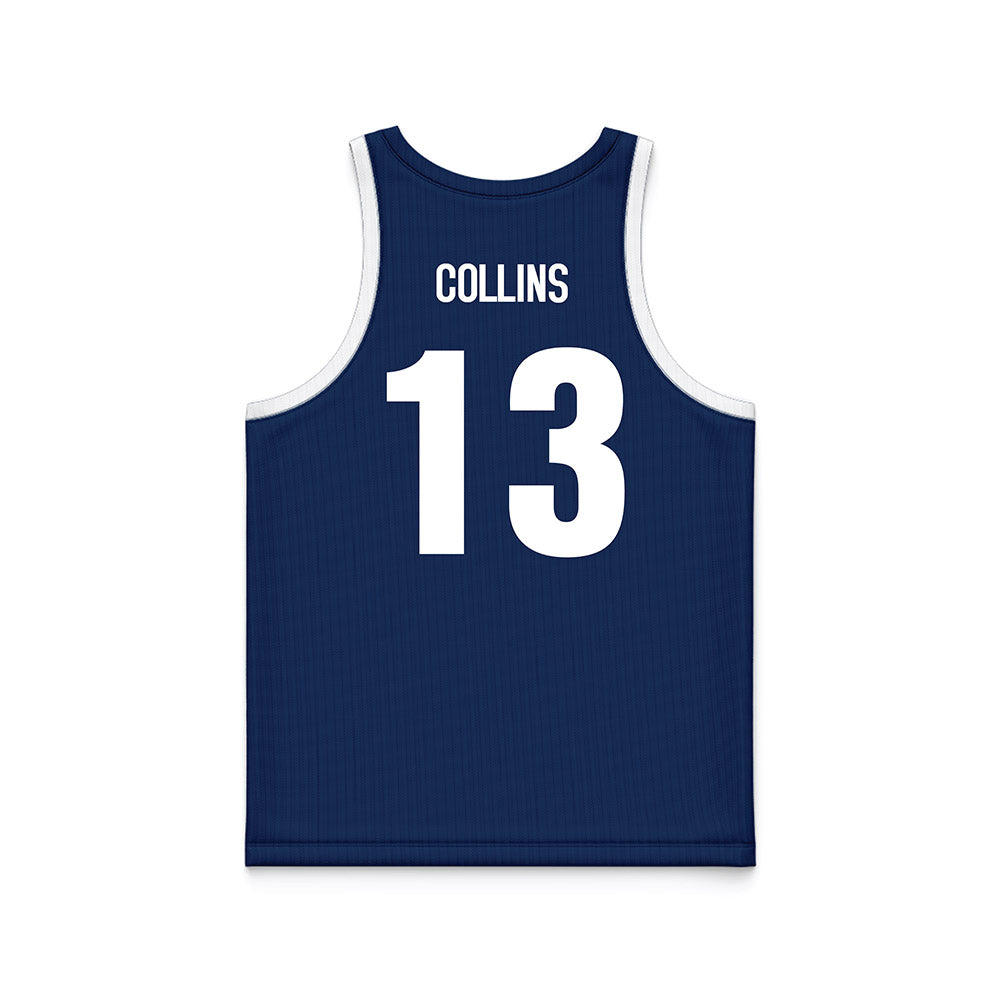 Monmouth - NCAA Men's Basketball : Jack Collins - Blue Jersey