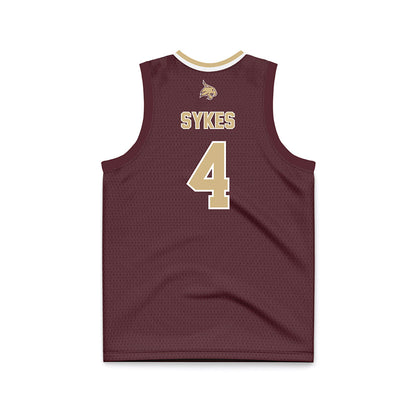 Texas State - NCAA Men's Basketball : Davion Sykes - Maroon Basketball Jersey